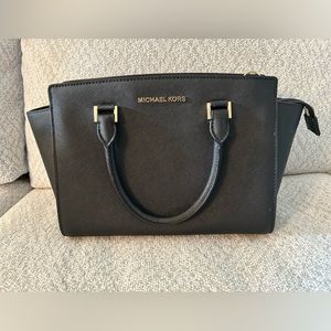 Black Michael Kors satchel.